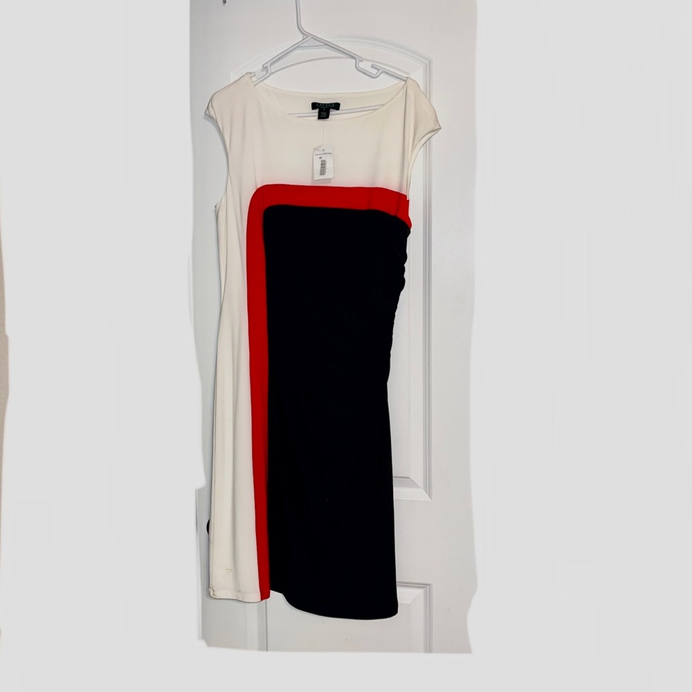 Size 14 dress never worn. May need to be dry cleaned.
